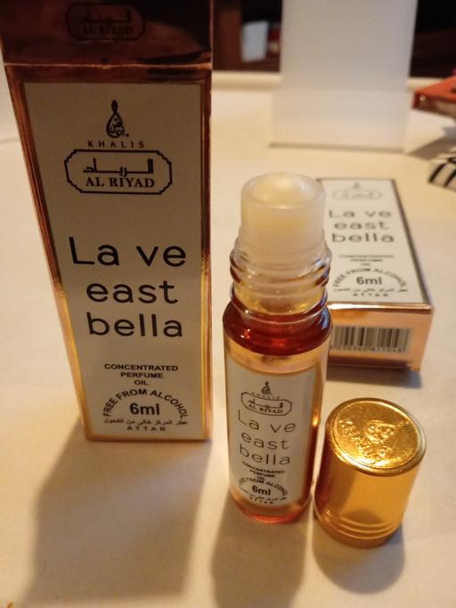  — 2 brand new ladies ROLL ON PERFUME OILS