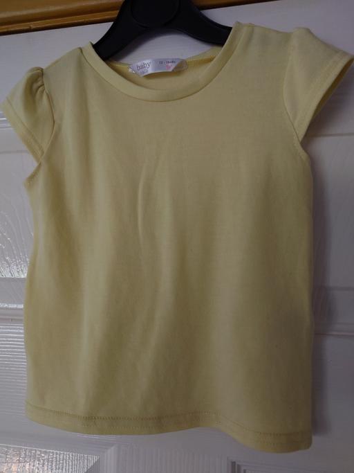  — Girls yellow top size 12-18 months