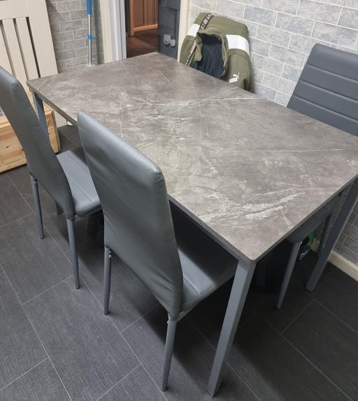  — dining room table and chairs