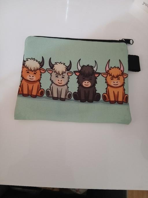  — Purse New