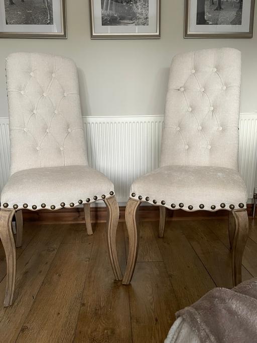  — Cream fabric chairs