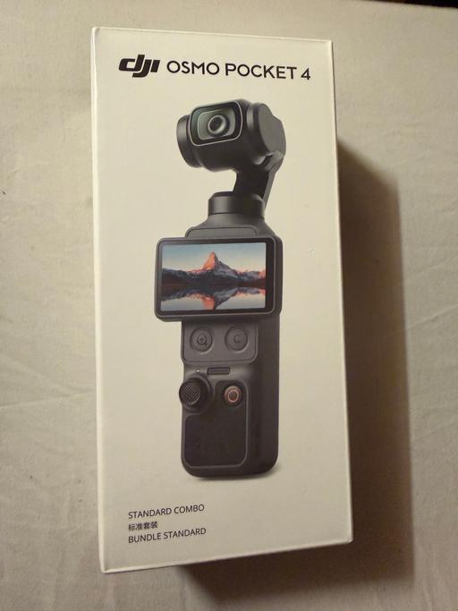  — Osmo pocket 4 with tripod and holder - new
