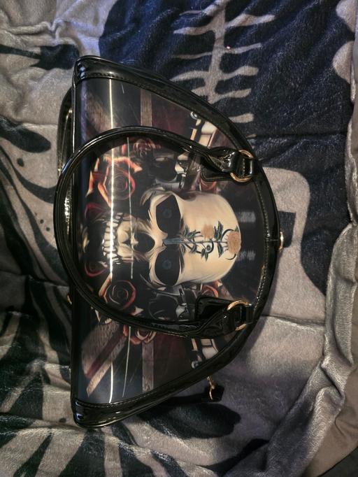  — skull hand bag like new
