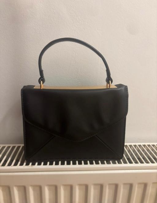 — Handbag