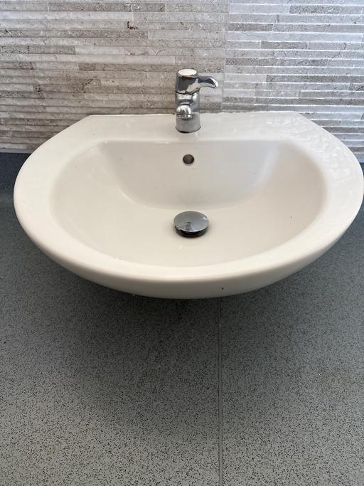  — White sink