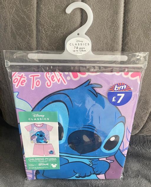  — Stitch pyjamas age 7/8 years