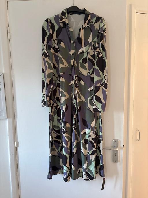  — New Roman dress tags still on size 10