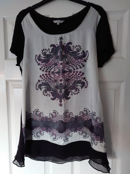  — Women's patterned top size 14