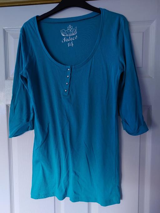  — Women's turquoise top size 14