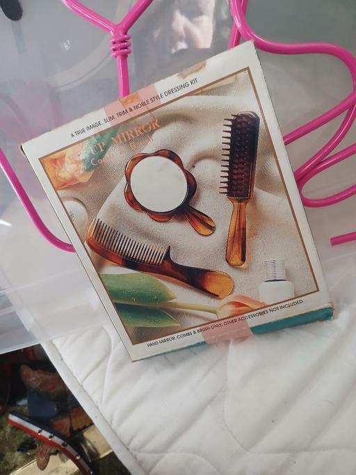  — brush and comb and mirrer