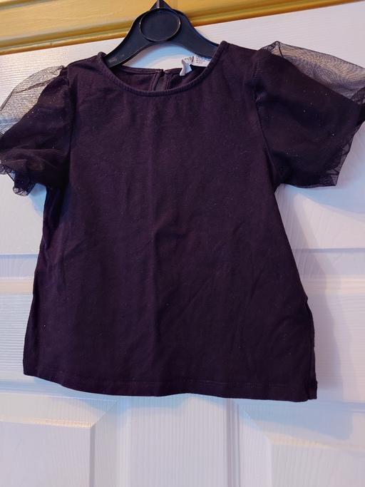  — Girls black top size 2-4 years