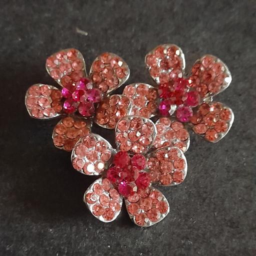  — BROOCH