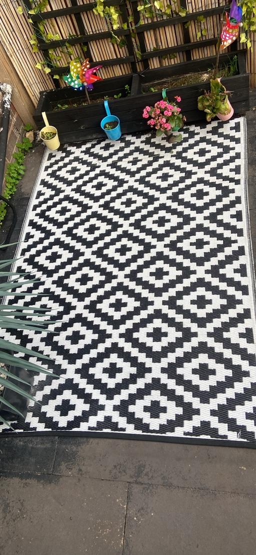 — Garden rug