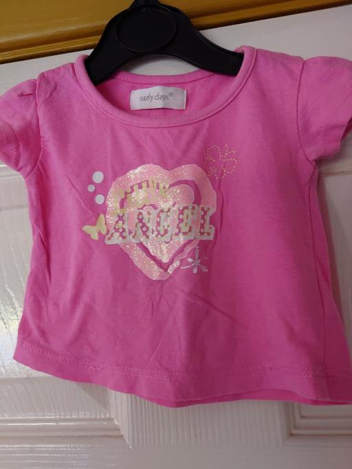  — Baby girls pink top size newborn
