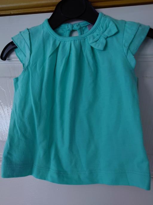  — Baby girls turquoise top size up to 3 months