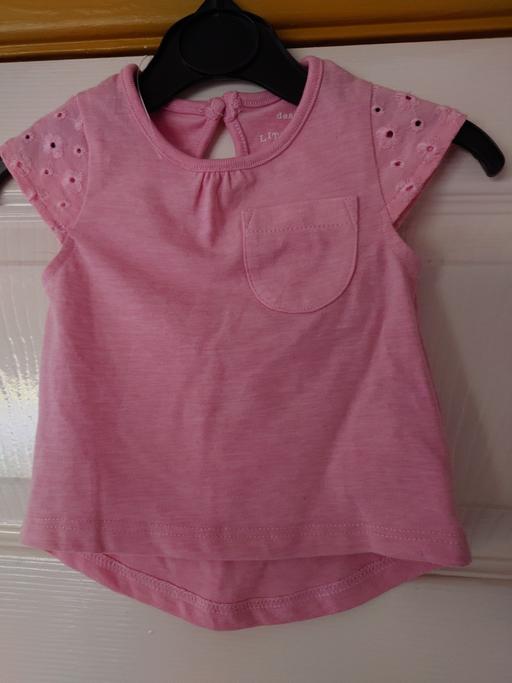  — Baby girls light pink top size up to 1 month