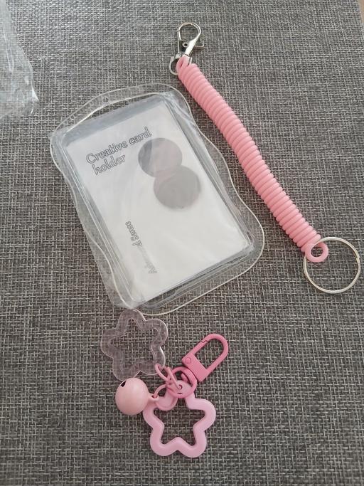  — Card Holder New
