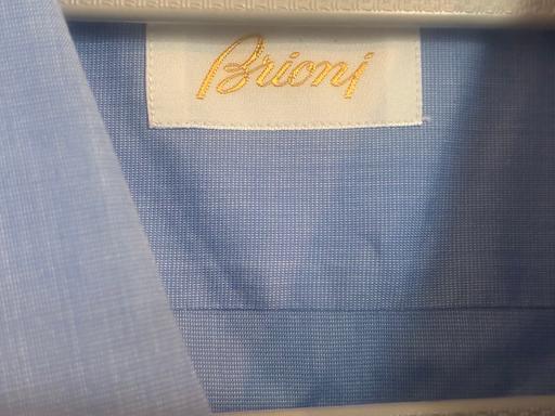  — Brioni