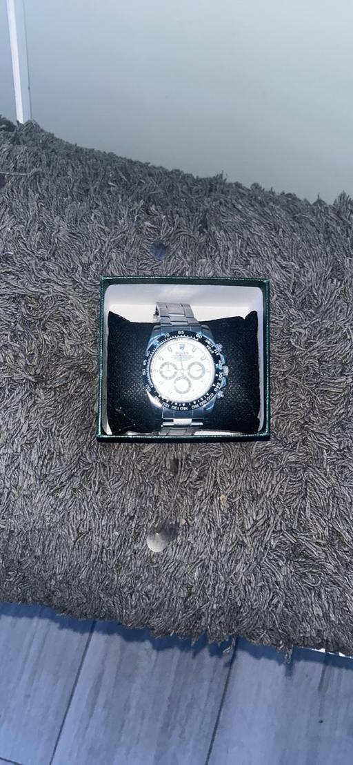 — Watch