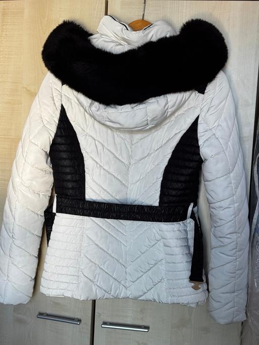  — Jacket