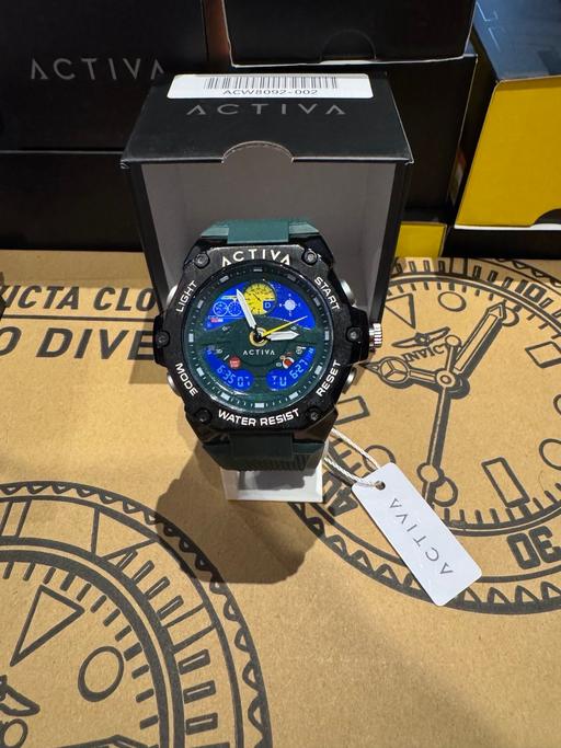  — Invicta Activa X Digital Men’s watch