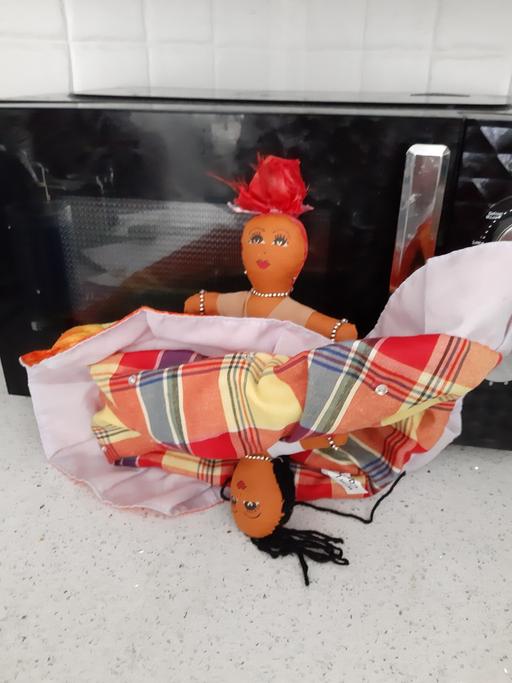  — bargain topsy turvy doll