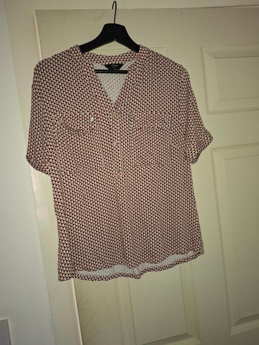  — ladies top size 10
