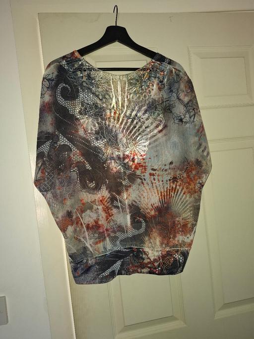  — ladies top size 10 to 12