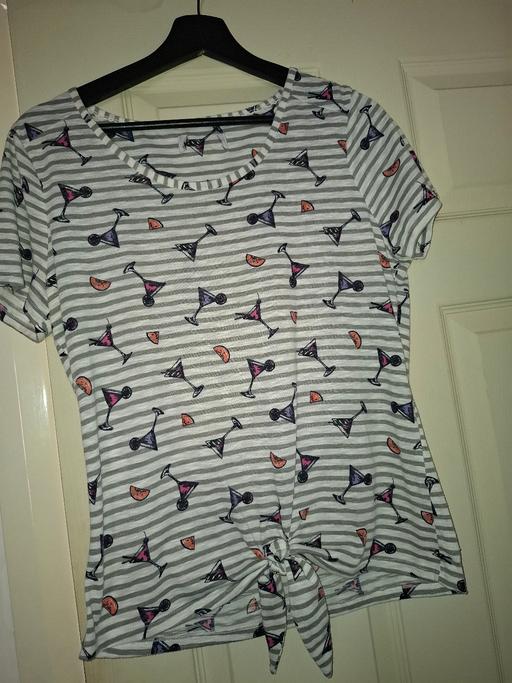  — ladies top size 10 to 12