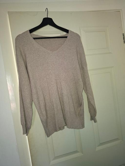  — ladies jumper size 12 to 14