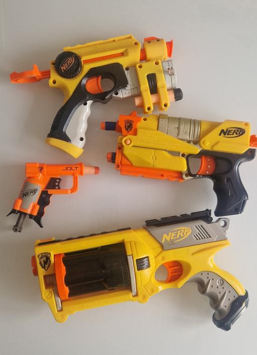  — Four Nerf guns