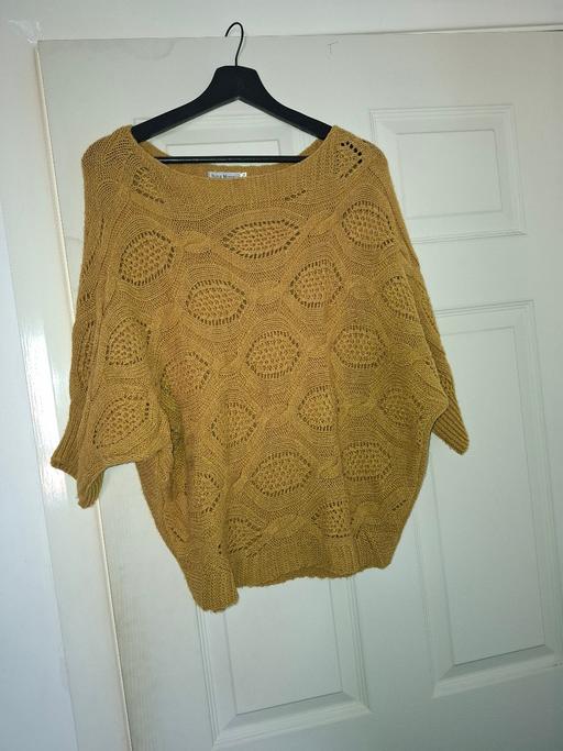  — ladies jumper size 10 to 12