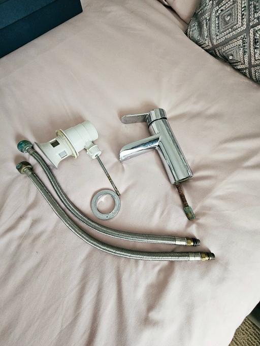  — Waterfall sink tap and parts.