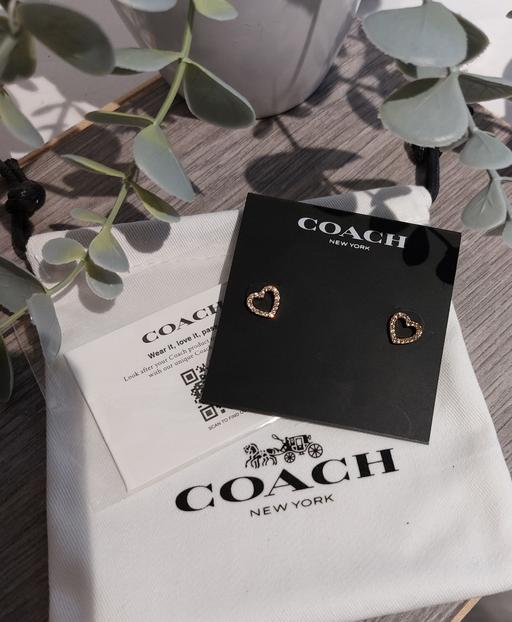  — Coach heart shaped earrings