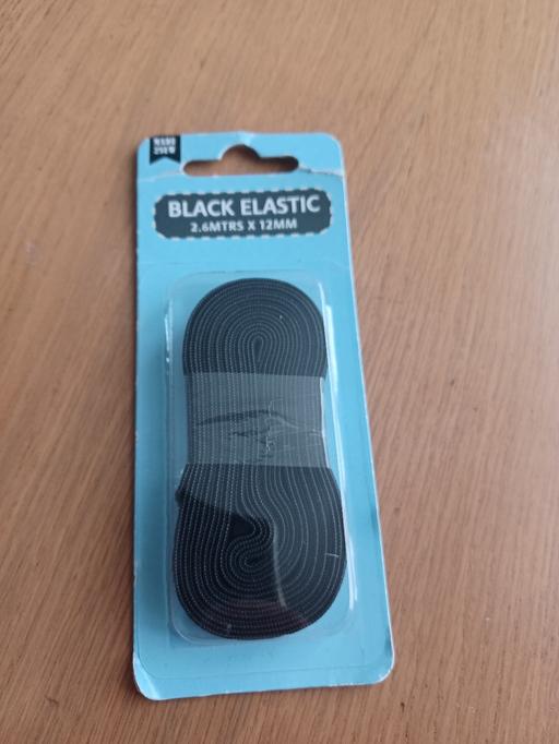  — Black elastic
