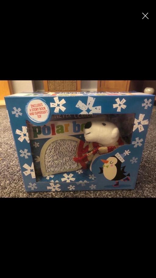  — Book and soft toy