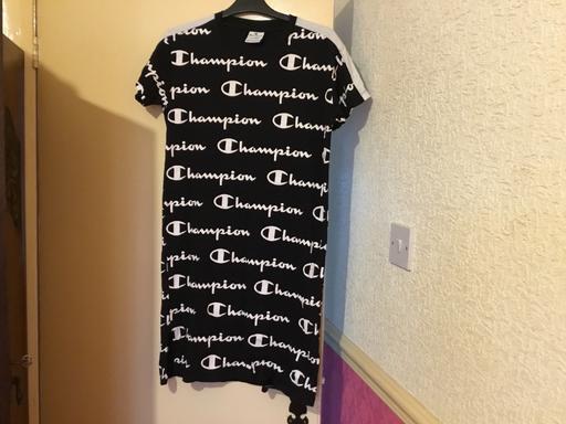  — Ladies Dress says XL more like M