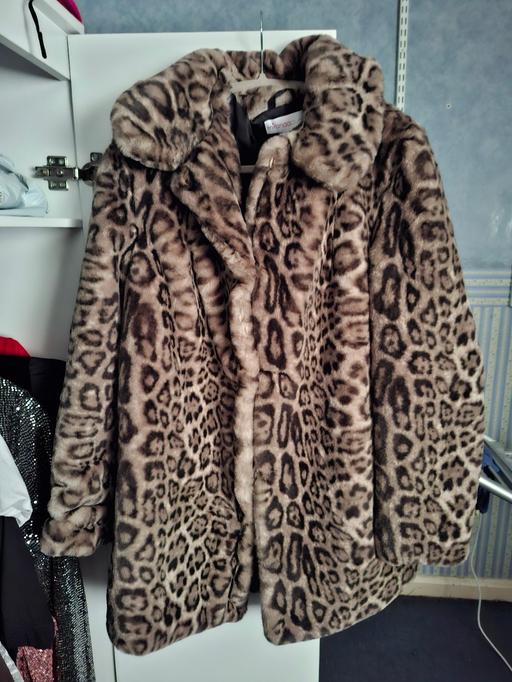 — coat