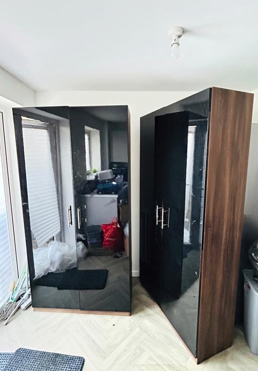  — 2xWardrobe with black glossy doors-£190 each