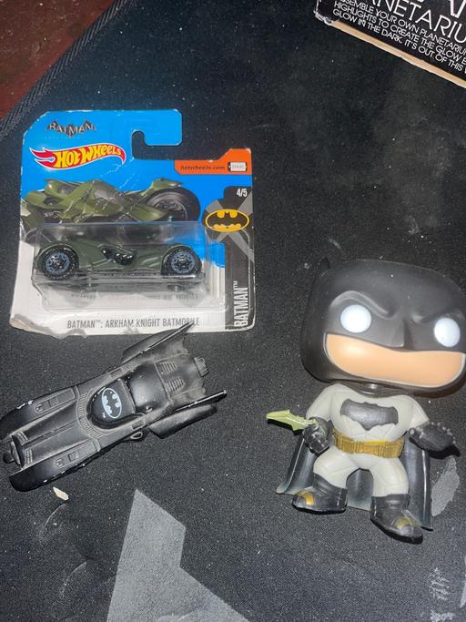  — A three piece Batman toy collector set