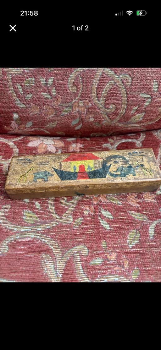  — Vintage wooden pencil box featuring