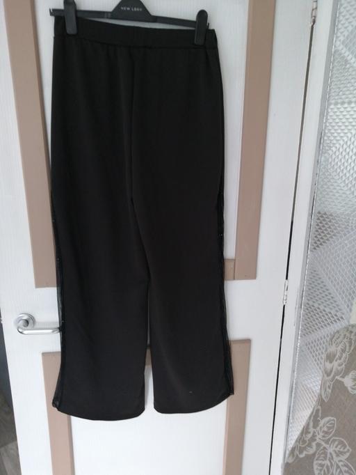  — ladies Trousers size *L*