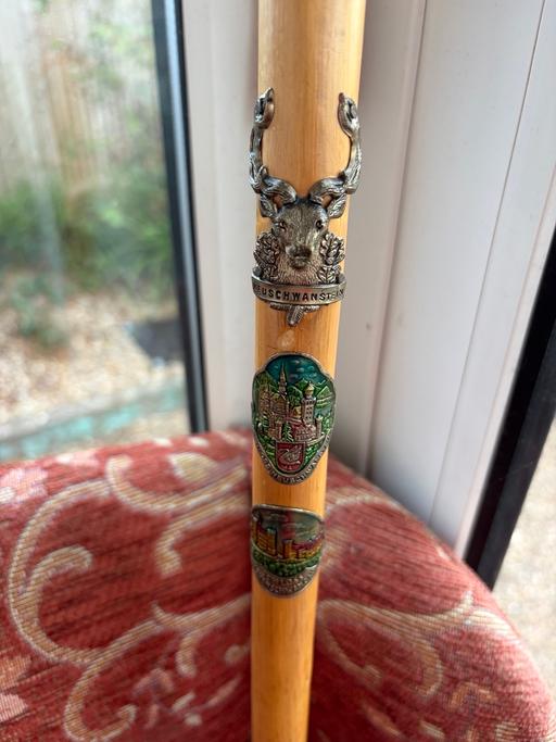  — Vintage walking stick with deckitive badges