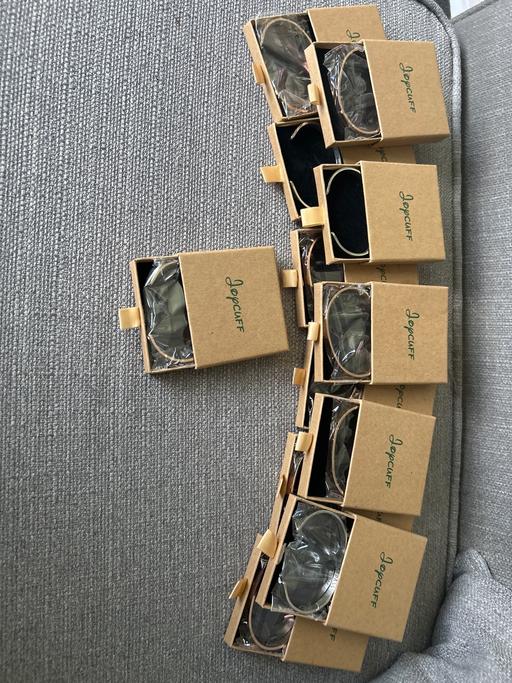  — 12 new bracelets different sayings on them