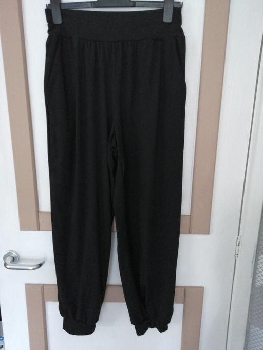  — ladies Trousers size *L*