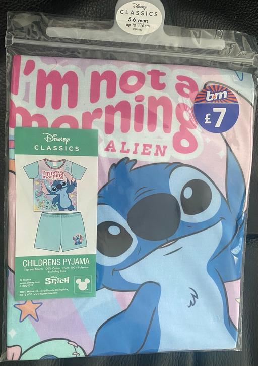  — Stitch pyjamas age 5/6 years