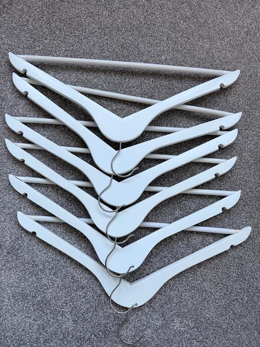  — 6 white hangers
