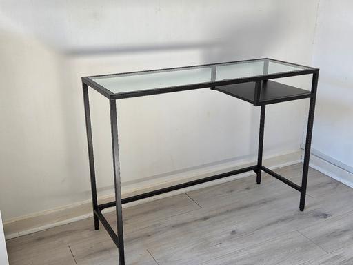  — Glass table