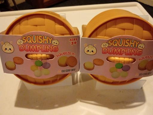  — 2 brand new SQUISHY DUMPLINGS SETS