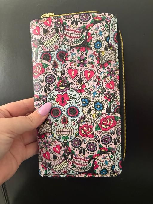  — New Purse